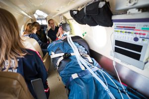 Photograph of patient in LifeFlight airplane